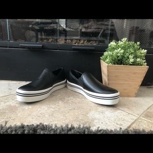 Dolce Vita- black and white slip on sneakers.